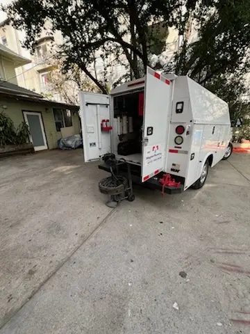 Magnet Plumbing service vehicle on-site for Water Heater Repair in Margo Gardens